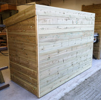 Bicycle shelter from Bluum Stores, with eco friendly green roof top. Bike storage, metal bike shed alternative. Outdoor cycle storage. Wooden bike store, scooter storage