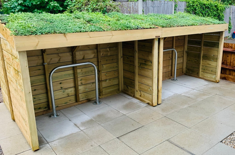 Bike shelter storage with a living green sedum roof 