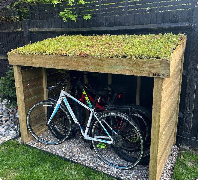 Bluum Stores bike shelter with a living sedum roof