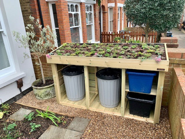 Dustbin and recycling store with a green roof planter