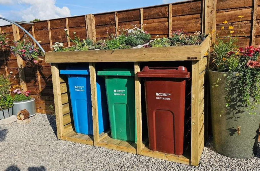 Triple wheelie bin store with living green roof planter  
