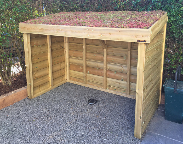 Bike shelter with sedum green roof, handmade in the UK with a feature living green roof.  Outdoor bike storage, bicycle or scooter shelter. Bike shed alternative to plastic or metal bike storage
