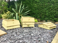 Stackable garden composting bin, made to look like a beehive. An attractive composter