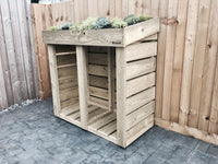 Sturdy high quality firewood log storage unit for your garden with a living green roof planter 